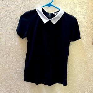 Vintage white collared short sleeved top.